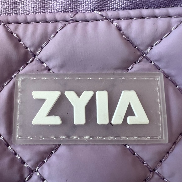 ZYIA LAVENDAR FANNIE PACK.Many compartments and zippered pouches. NEVER USED - Picture 2 of 4